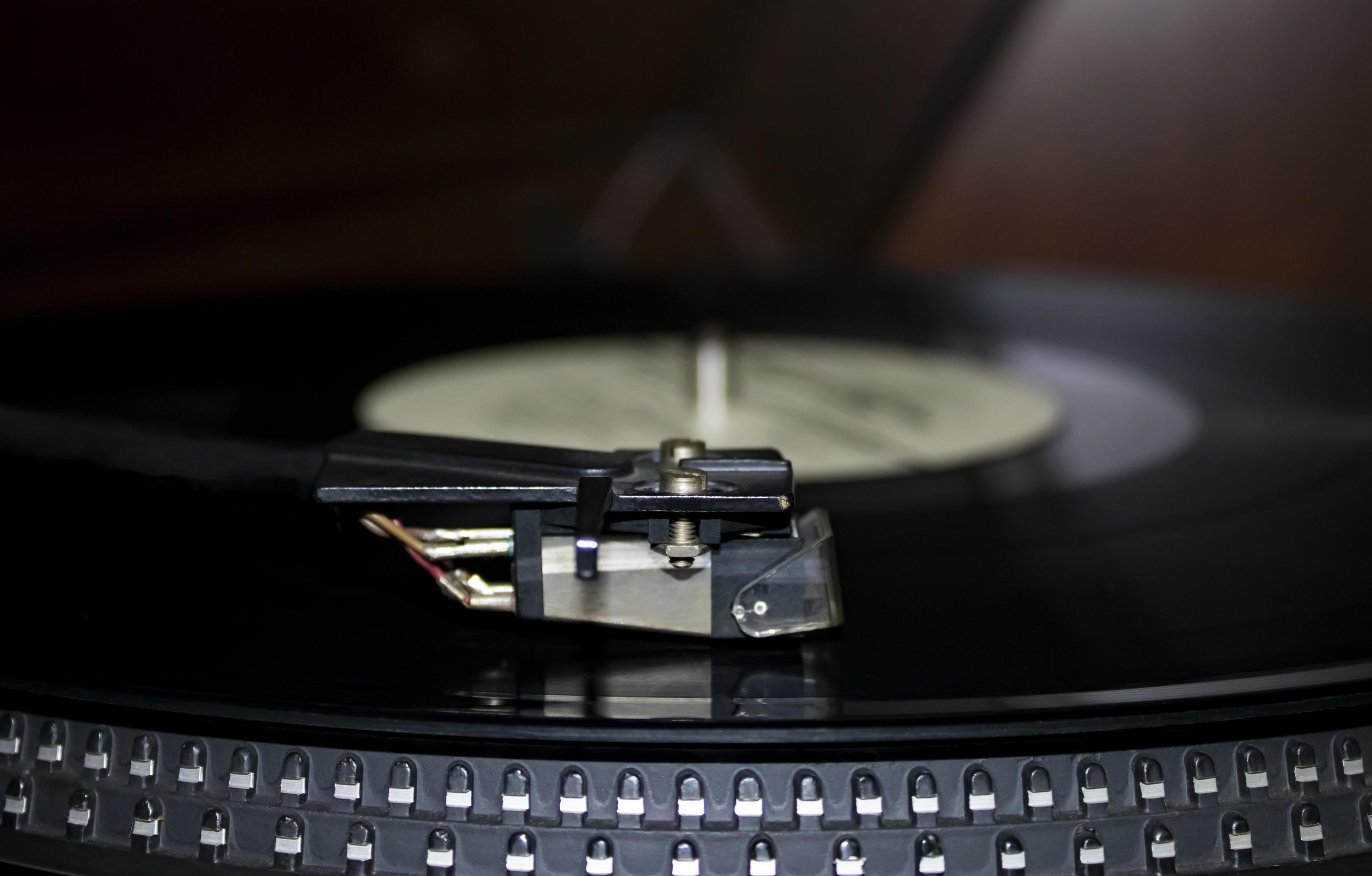 Turntable Playing Vinyl Close Up With Needle On The Record Stock Photo At Vecteezy