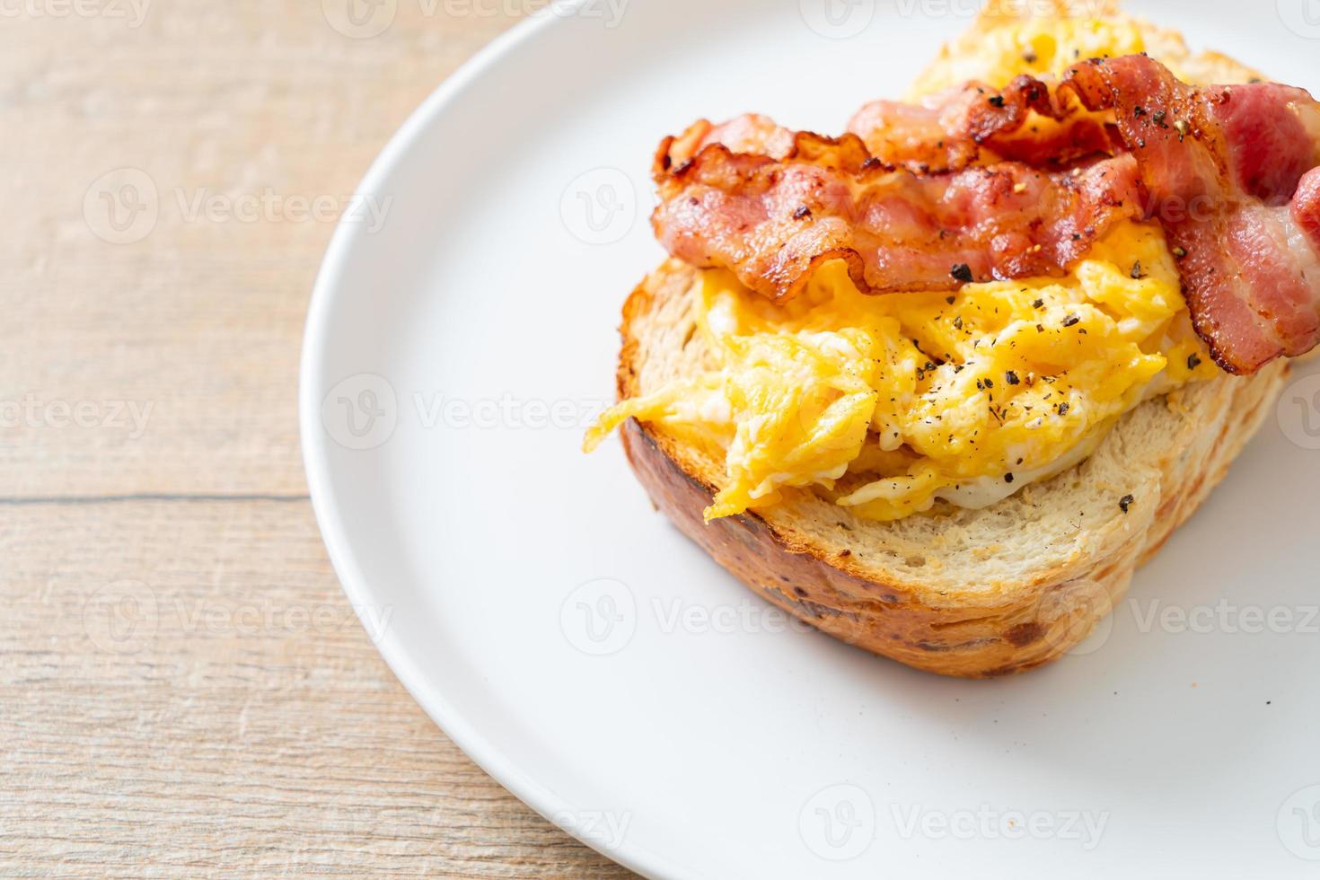 bread toast with scramble egg and bacon photo