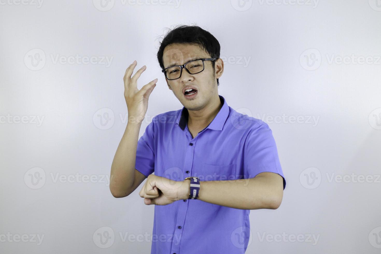 Being late to work and deadline, Young asian man is time delay and late on project. Executive angry, hurry, stress, frustrated and unsatisfied worker man lateness to office. photo