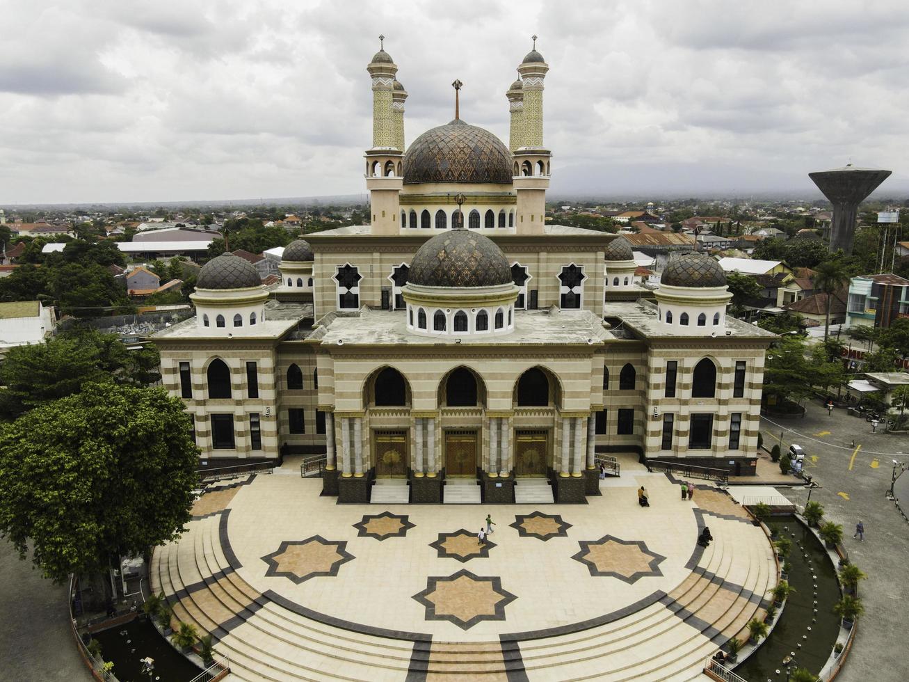 Aerial view of the mosque in Klaten, Indonesia starting from the Door. Klaten, Indonesia - December 2020 photo