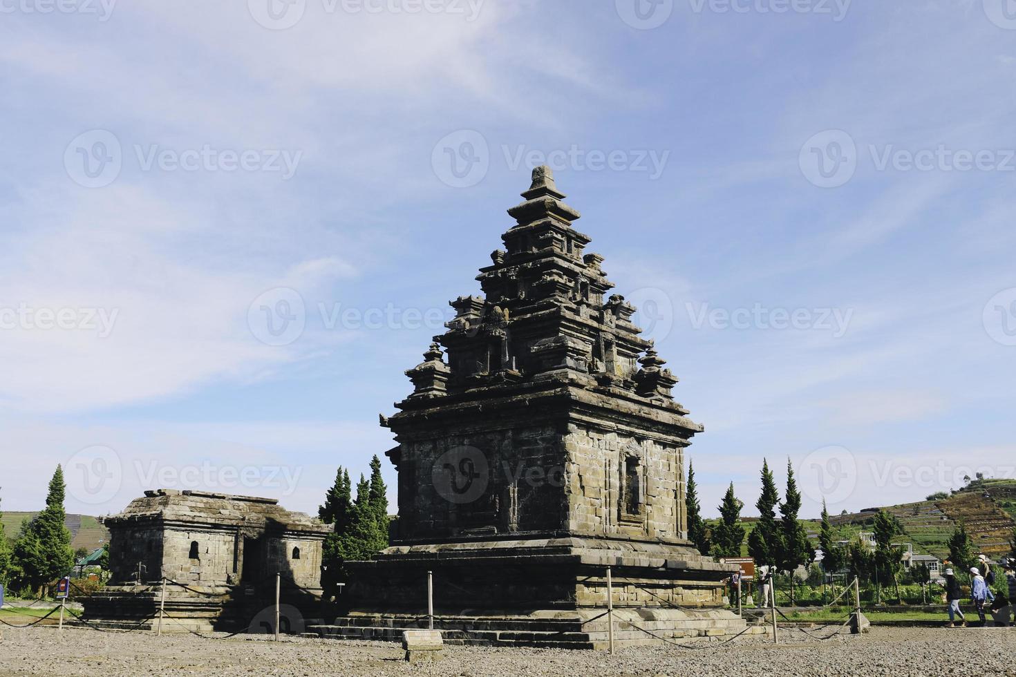 Local tourists visit Arjuna temple complex at Dieng Plateau. photo