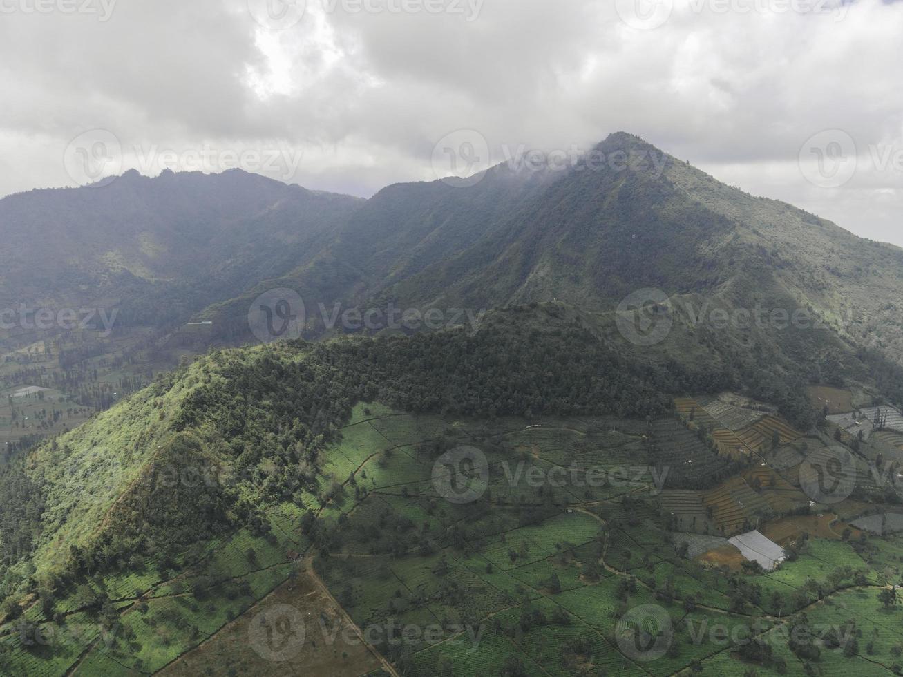Aerial view of mountain valley with green scenery in Sindoro vulcano photo