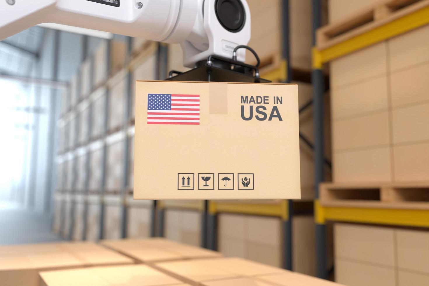 The Robot arm picks up the cardboard box Made in USA, Automation robot arm in the storehouse photo