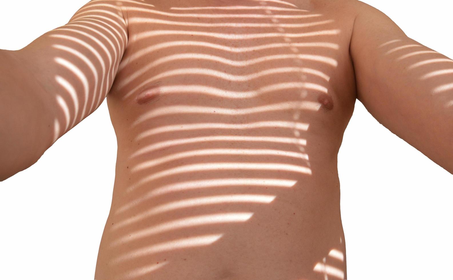 Man in streaks of sunlight photo