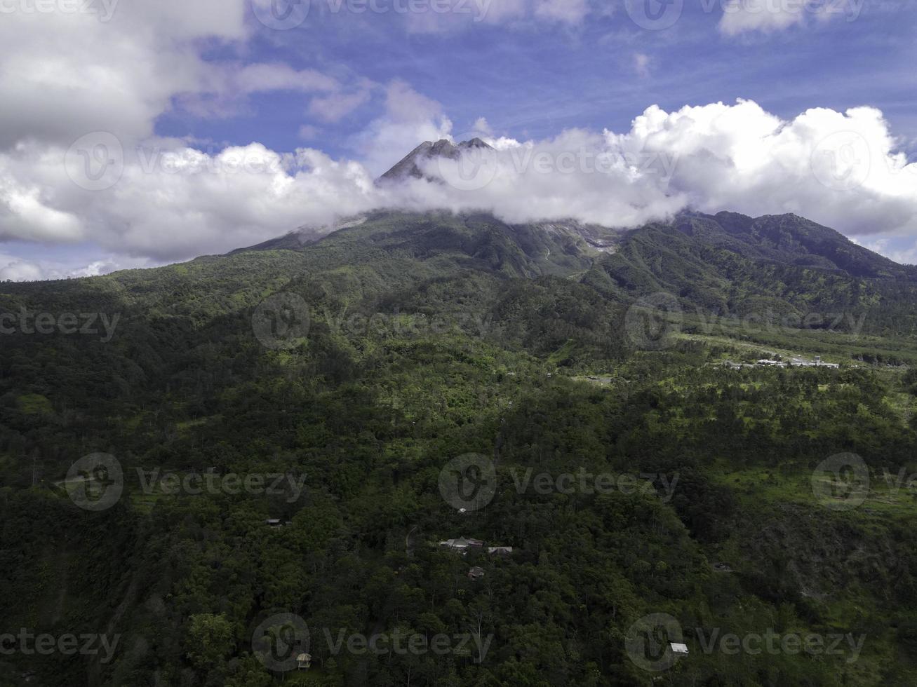 Aerial view of Mount Merapi Landscape with rice field and village in Yogyakarta, Indonesia Volcano Landscape View. photo