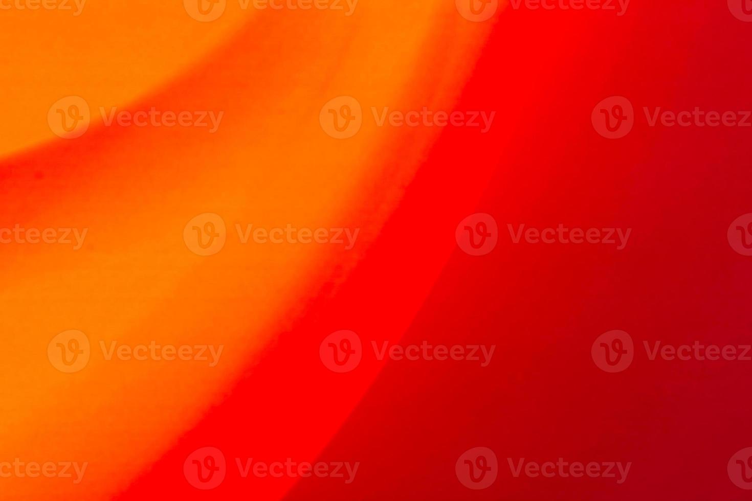 Red orange abstract gradient background with waves photo