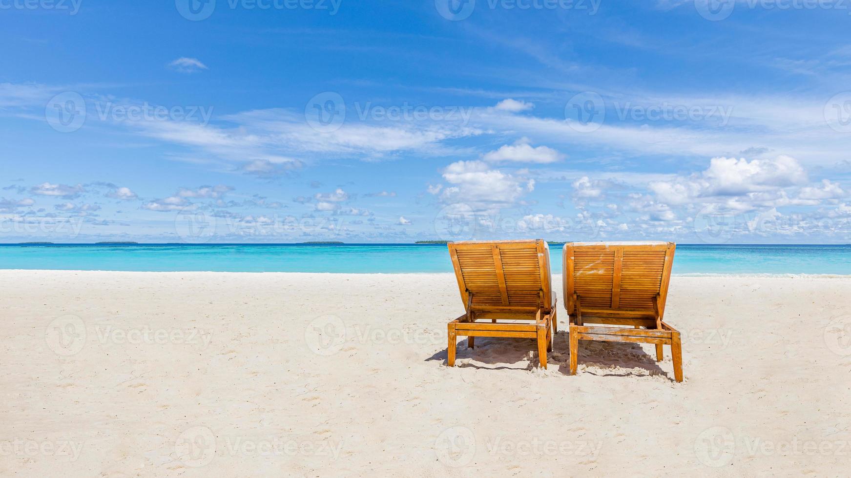 Chaise lounge on beach. Beautiful beach. Chairs on the sandy beach near the sea. Summer holiday and vacation concept for tourism. Inspirational tropical landscape photo