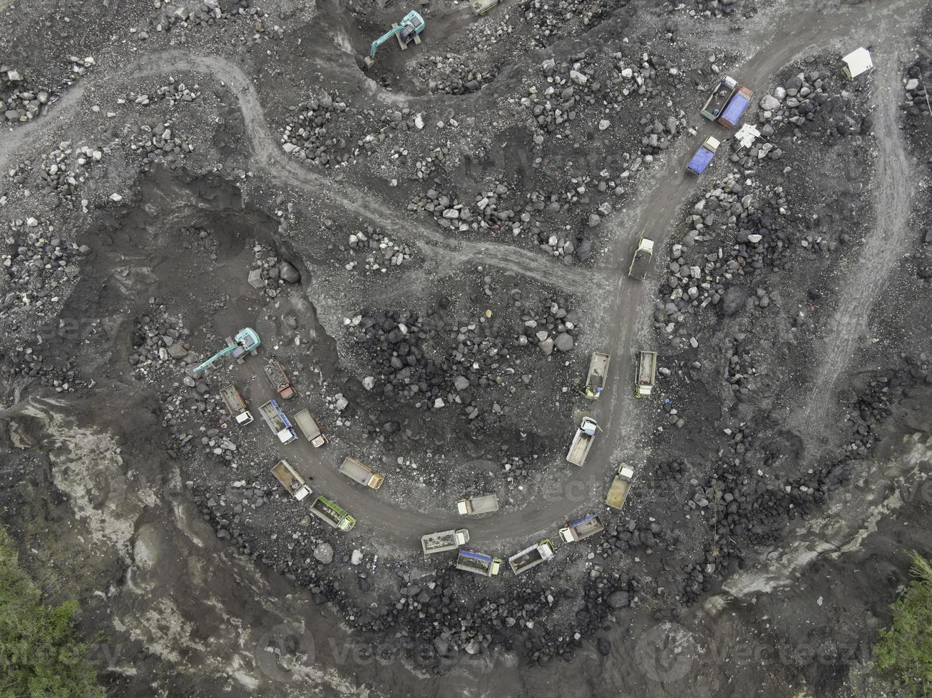 Aerial top view of sand and stone mine in merapi mountain Indonesia. photo