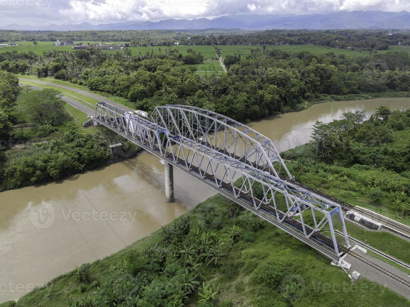 Aerial View of Train Bridge above Progo River in Yogyakarta, Indonesia. photo