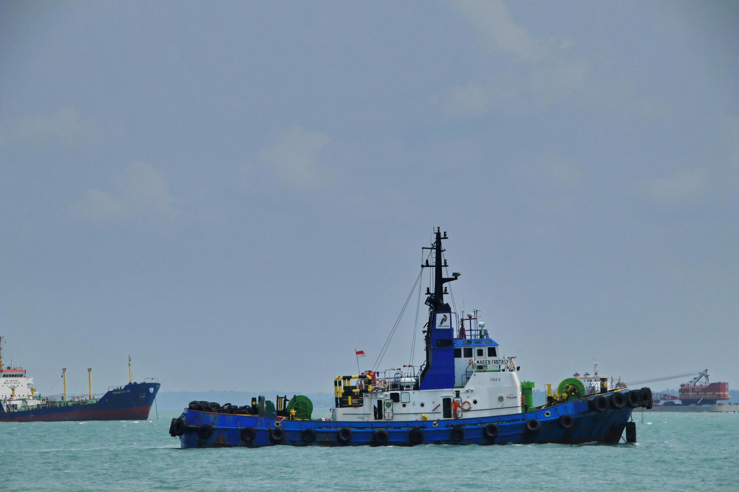 Various ship activities at the Port of Sri Bintan Pura in the city of Tanjung Pinang namely on the west coast of the island of Bintan photo