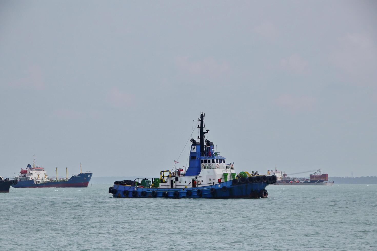 Various ship activities at the Port of Sri Bintan Pura in the city of Tanjung Pinang namely on the west coast of the island of Bintan photo