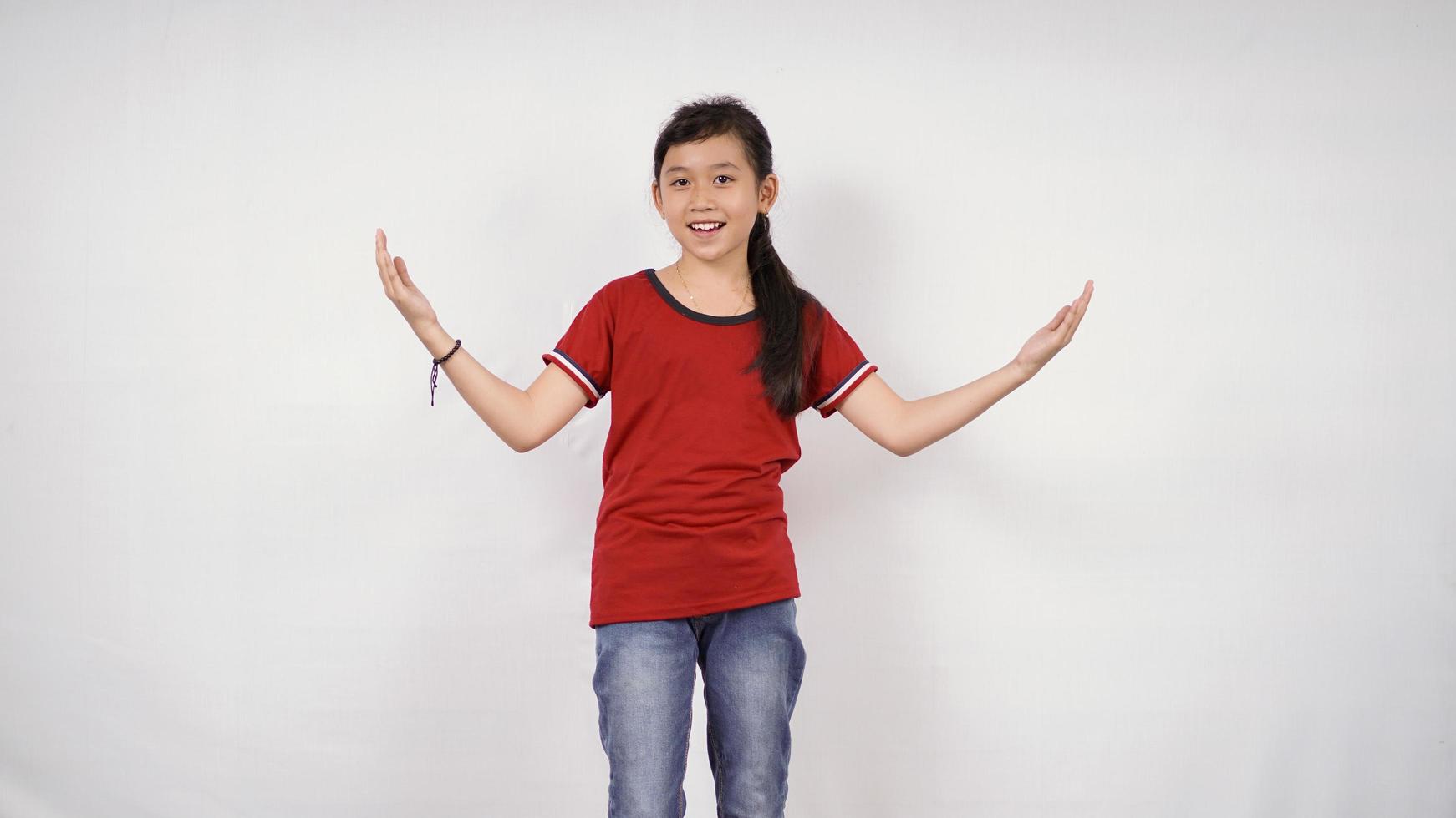 beautiful little girl posing happily isolated on white background photo