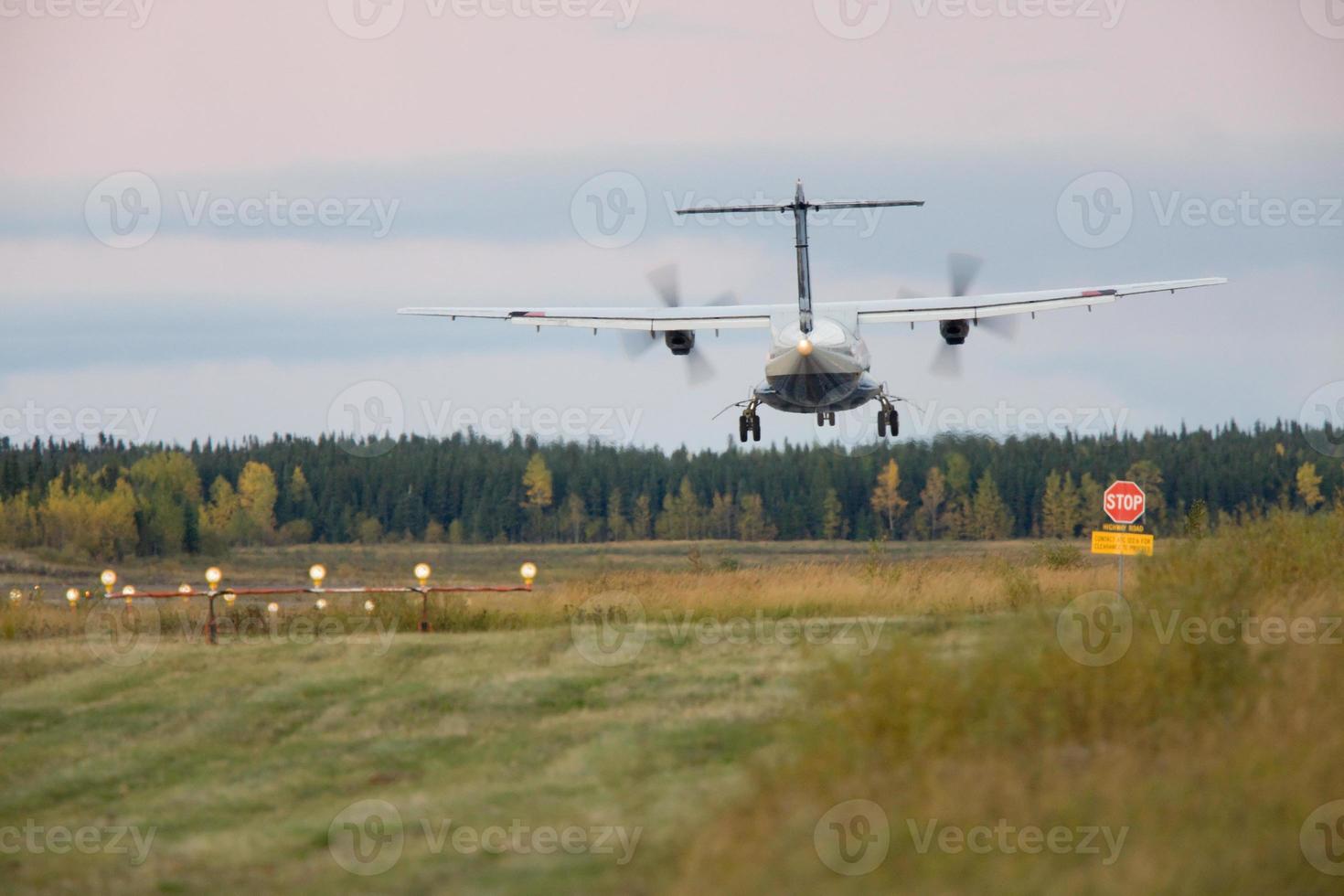 Plane landing Thompson Manitoba Airport photo