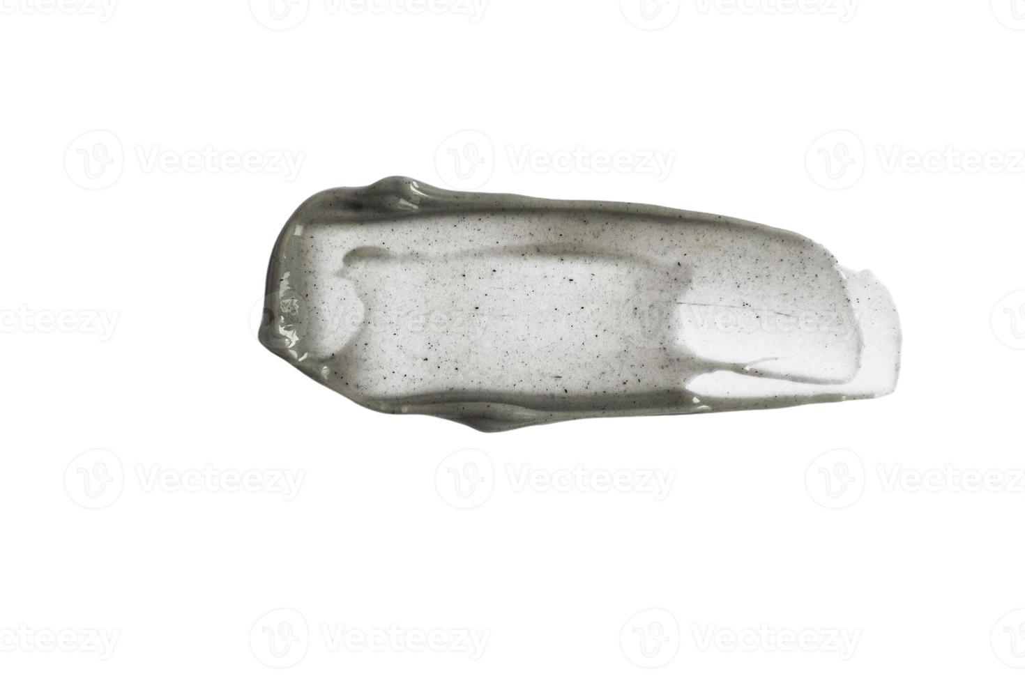 Black and gray smear with scrub effect, cream on a white background photo