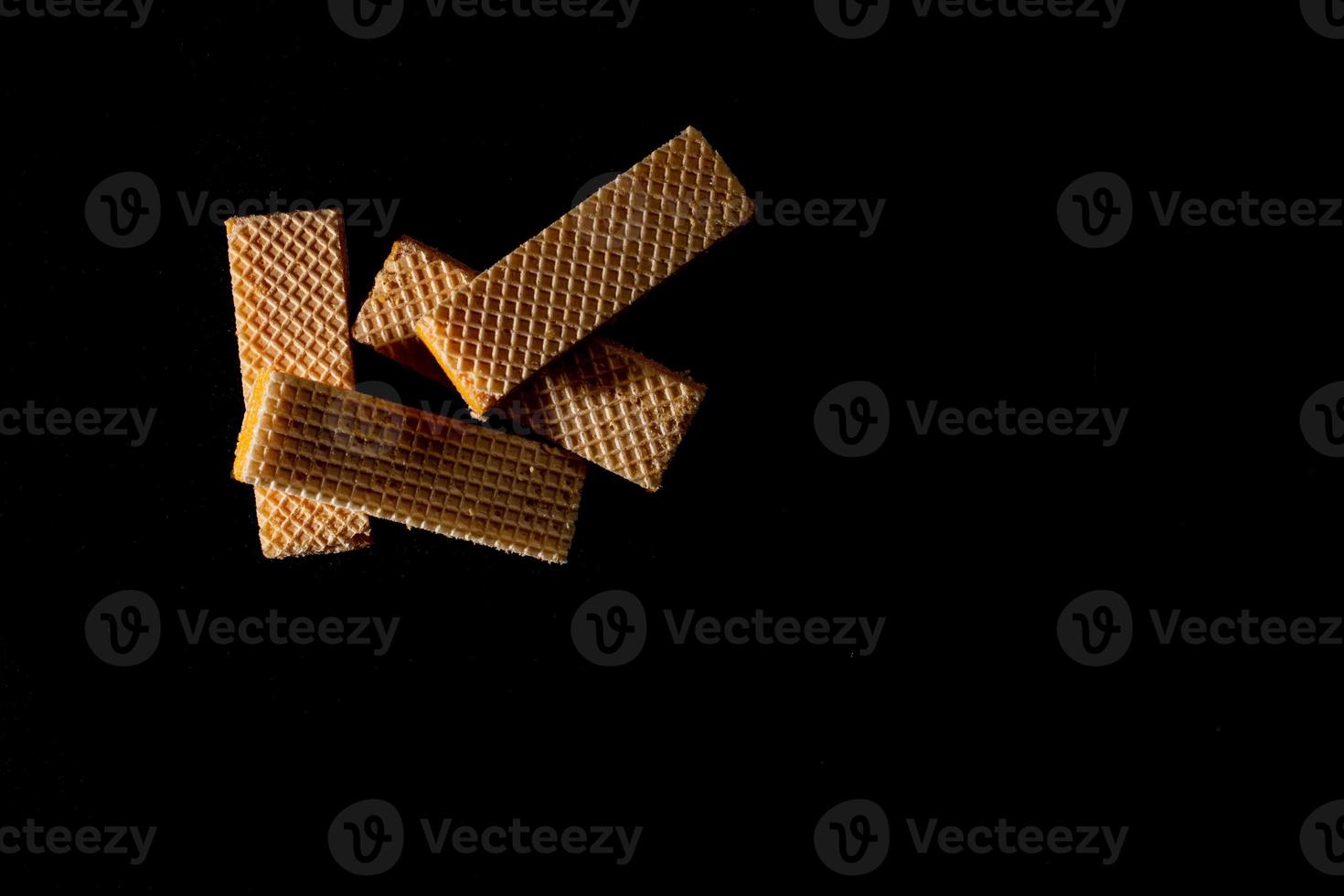 Top view four wafer on black background with copy space. photo