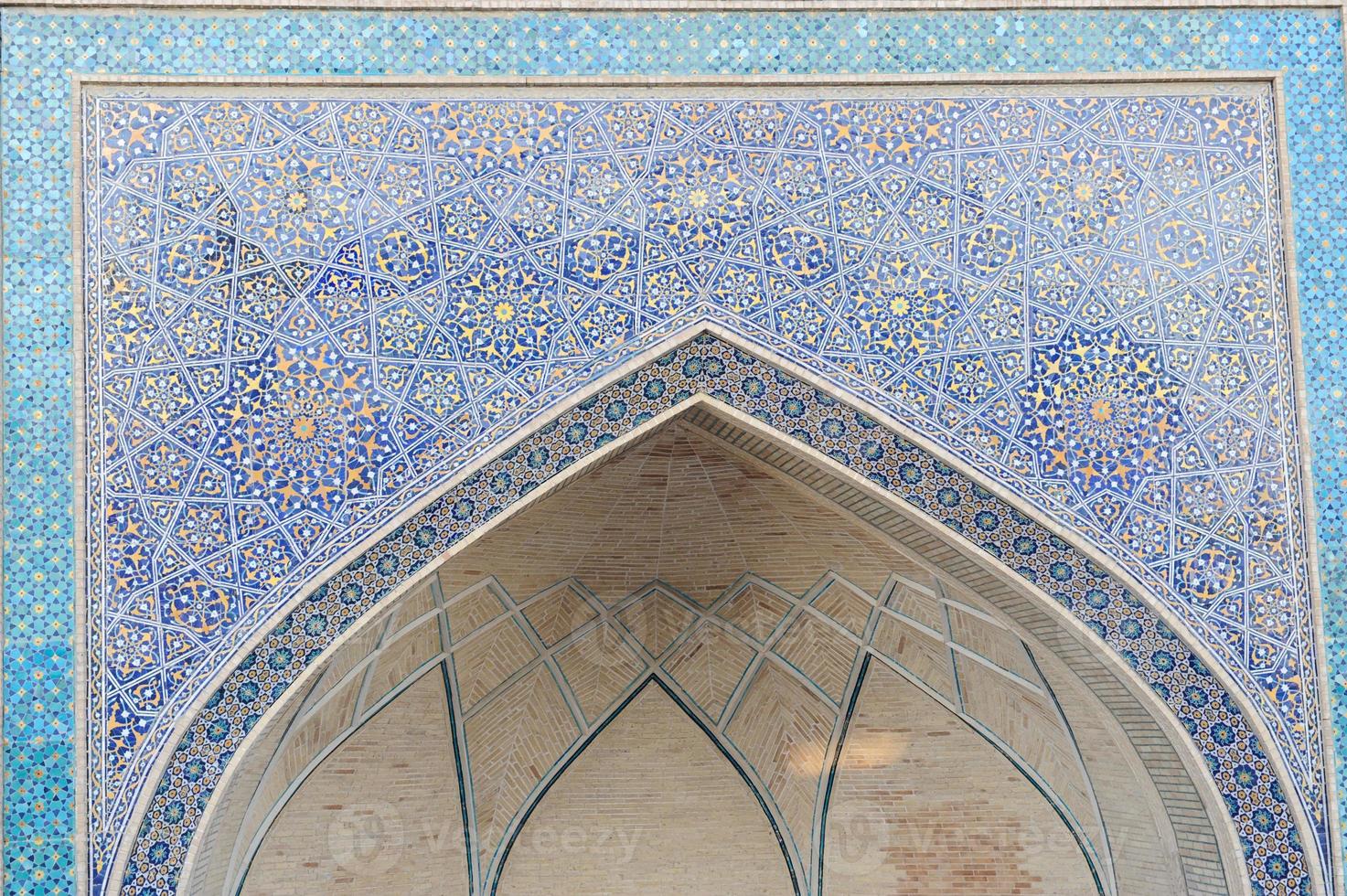 Elements of ancient architecture of Central Asia. Arch and gates of the ancient Asian traditional ornament. photo