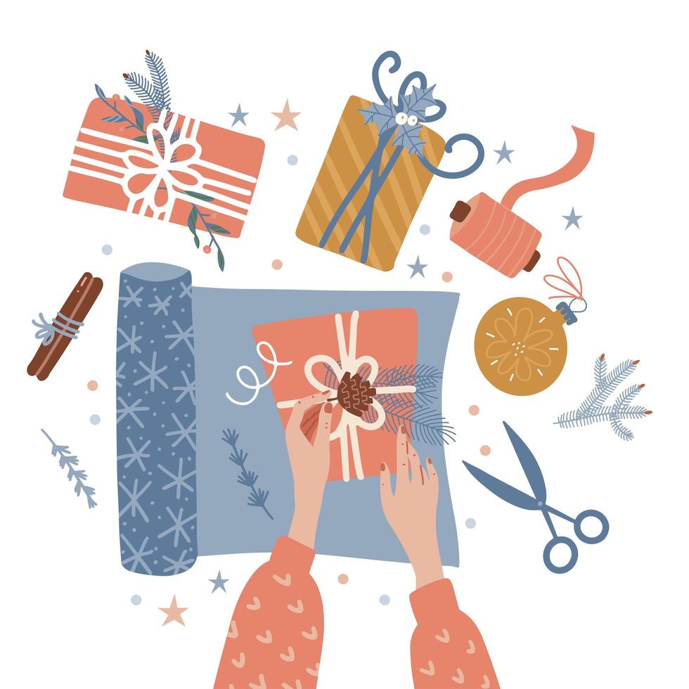 proceso de envolver cajas de regalo de navidad. dos manos femeninas preparándose para la celebración de la víspera de navidad o año nuevo. mesa de vista superior con artículos tijeras, ramas, rollo de papel. endecha plana imagen vectorial plana vector