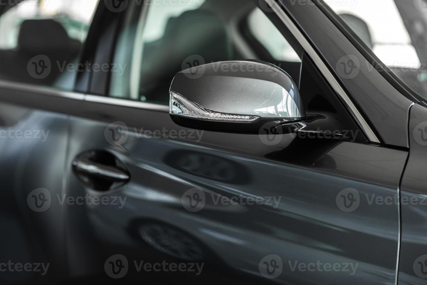 rear view mirror. Focus to mirror view. side rear-view mirror on a car. photo