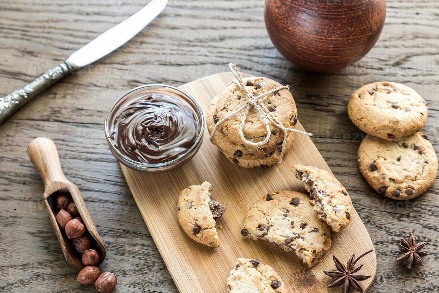 Cookies with chocolate cream and hazelnuts photo