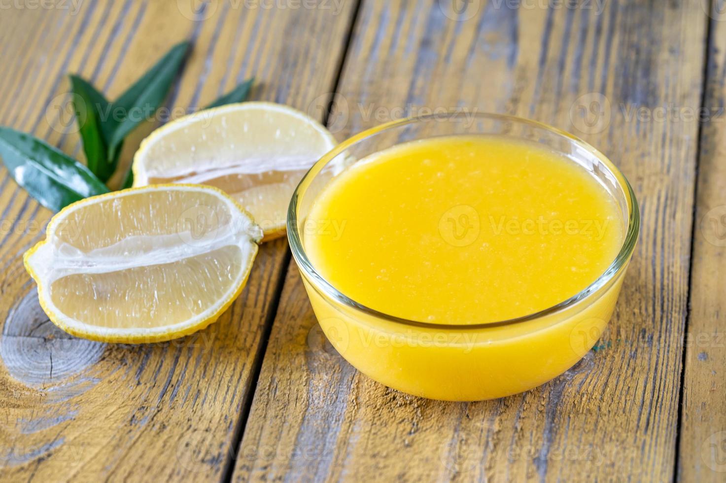 Glass bowl of lemon curd photo