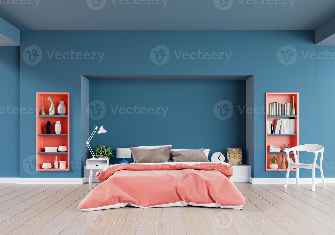 dormitorio de color coral vivo de una casa de lujo con cama doble y silla en el suelo con paredes azul oscuro en el suelo de madera. foto