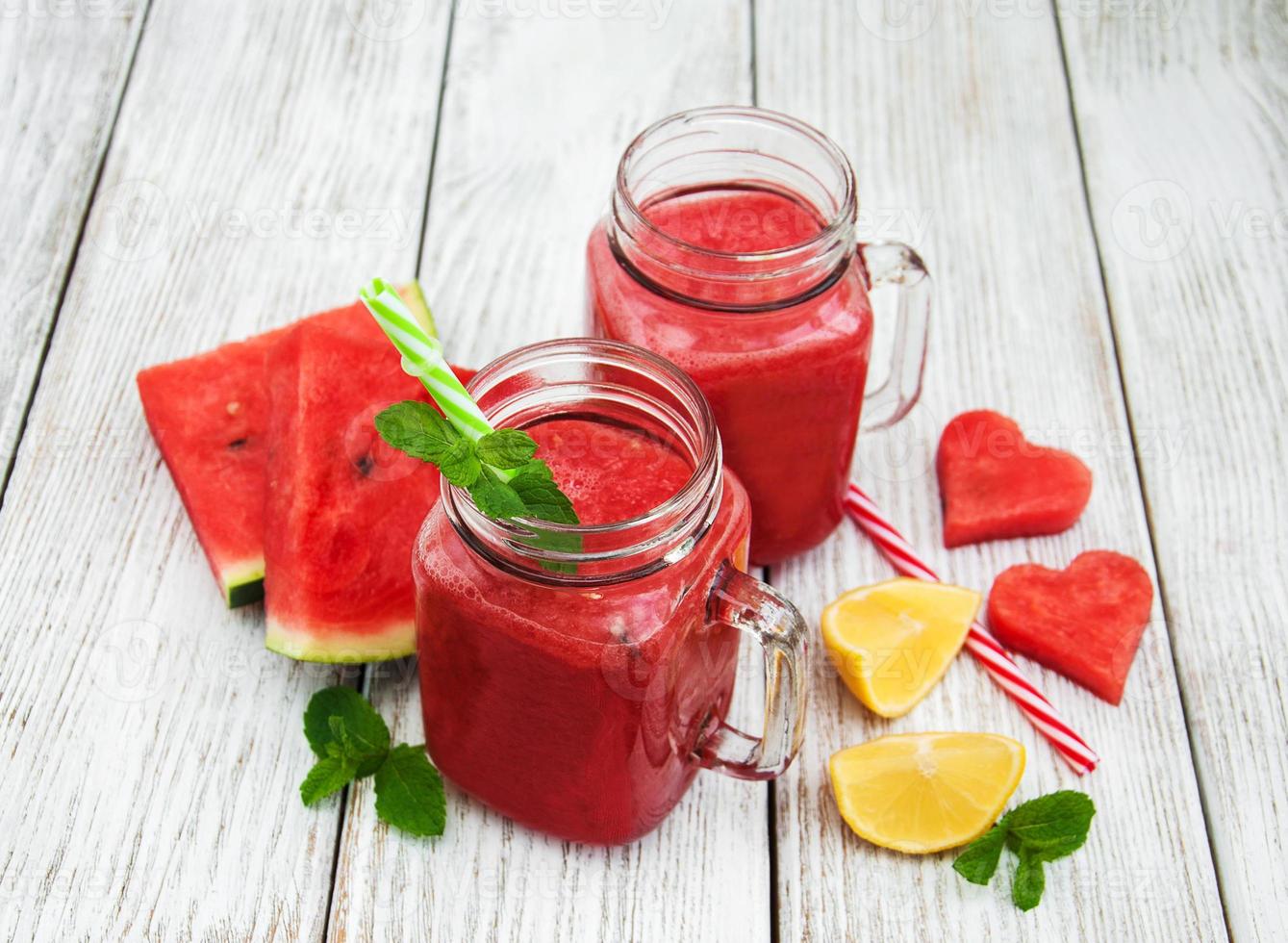 Jars with watermelon smoothie photo