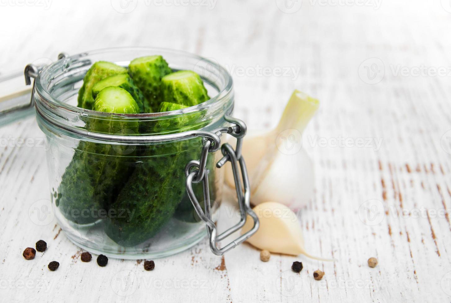 Fresh cucumbers on table photo