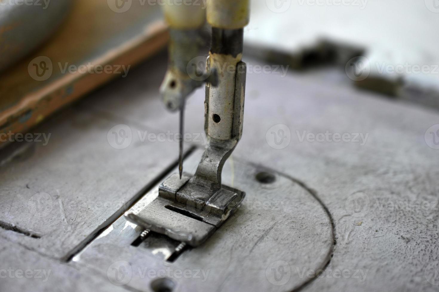 An old sewing machine in the workshop photo