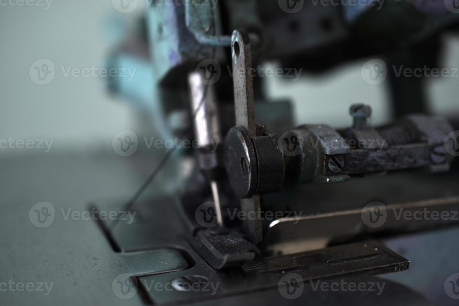 An old sewing machine in the workshop photo