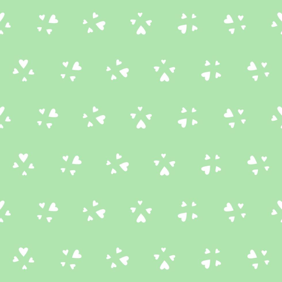 Cute heart seamless pattern on a green background vector