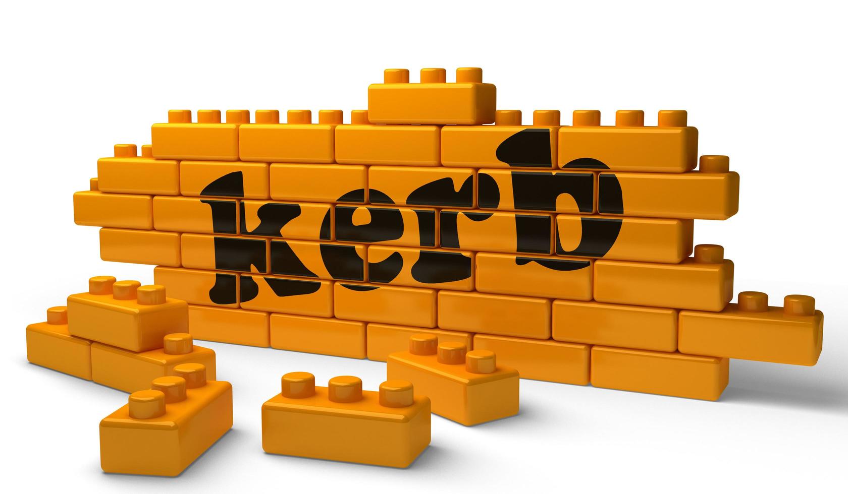 kerb word on yellow brick wall photo