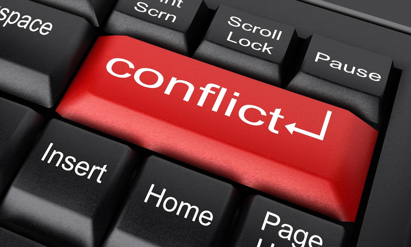 conflict word on red keyboard button photo