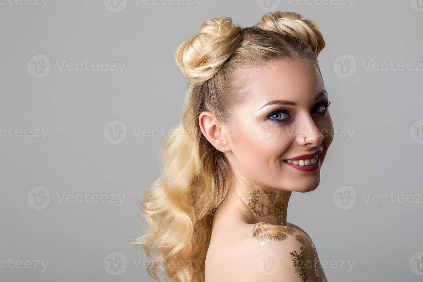 portrait of a beautiful young woman with professional make-up beauty and fashion, cosmetology and Spa photo