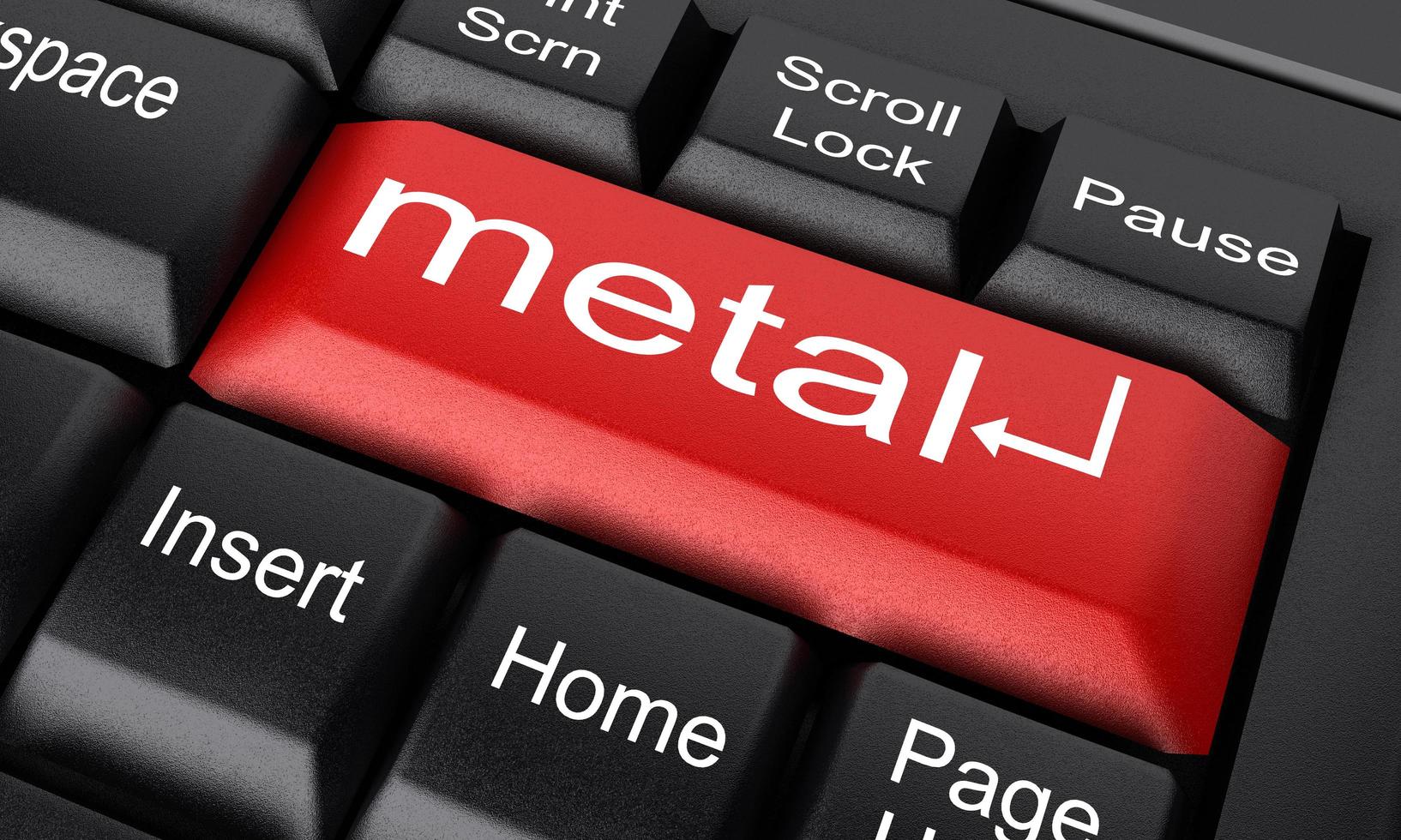 palabra de metal en el botón rojo del teclado foto