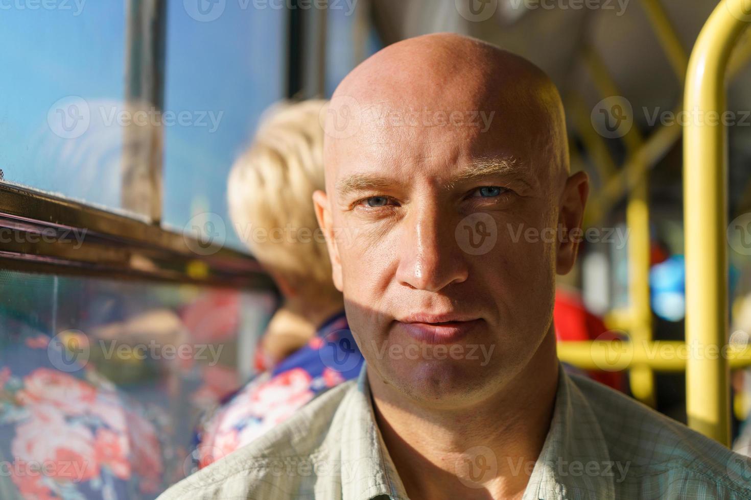 Bus interior with passengers. Passengers in a city bus. Modern public transport photo