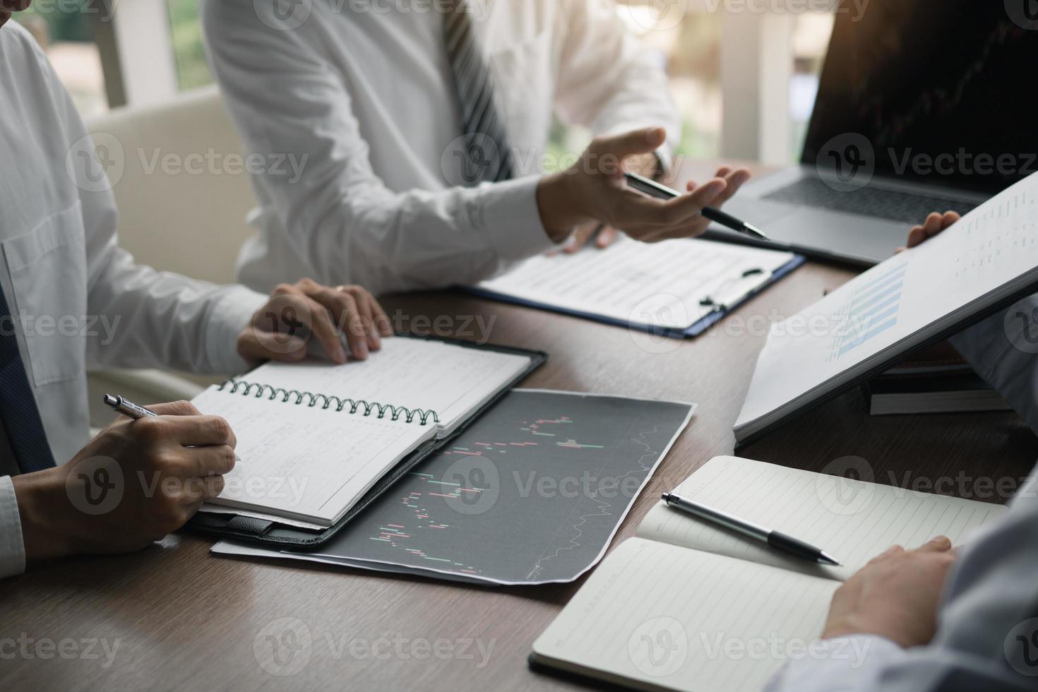 Group of businessmen are disputing about the wrong financial budget of the company and sharing the correct analysis. photo