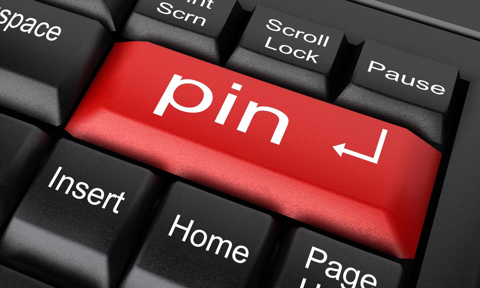 pin word on red keyboard button photo