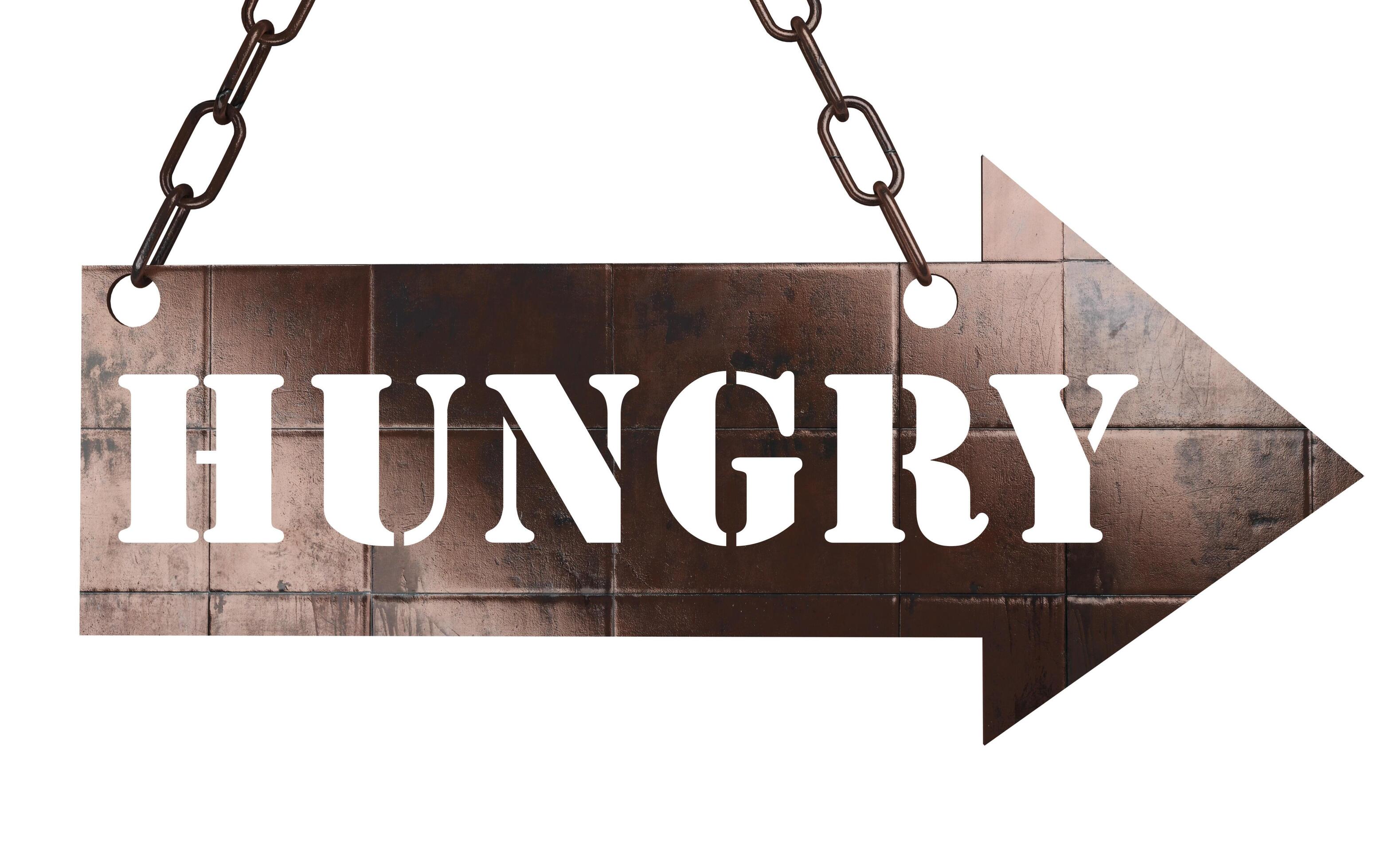 hungry word on metal pointer 6064163 Stock Photo at Vecteezy