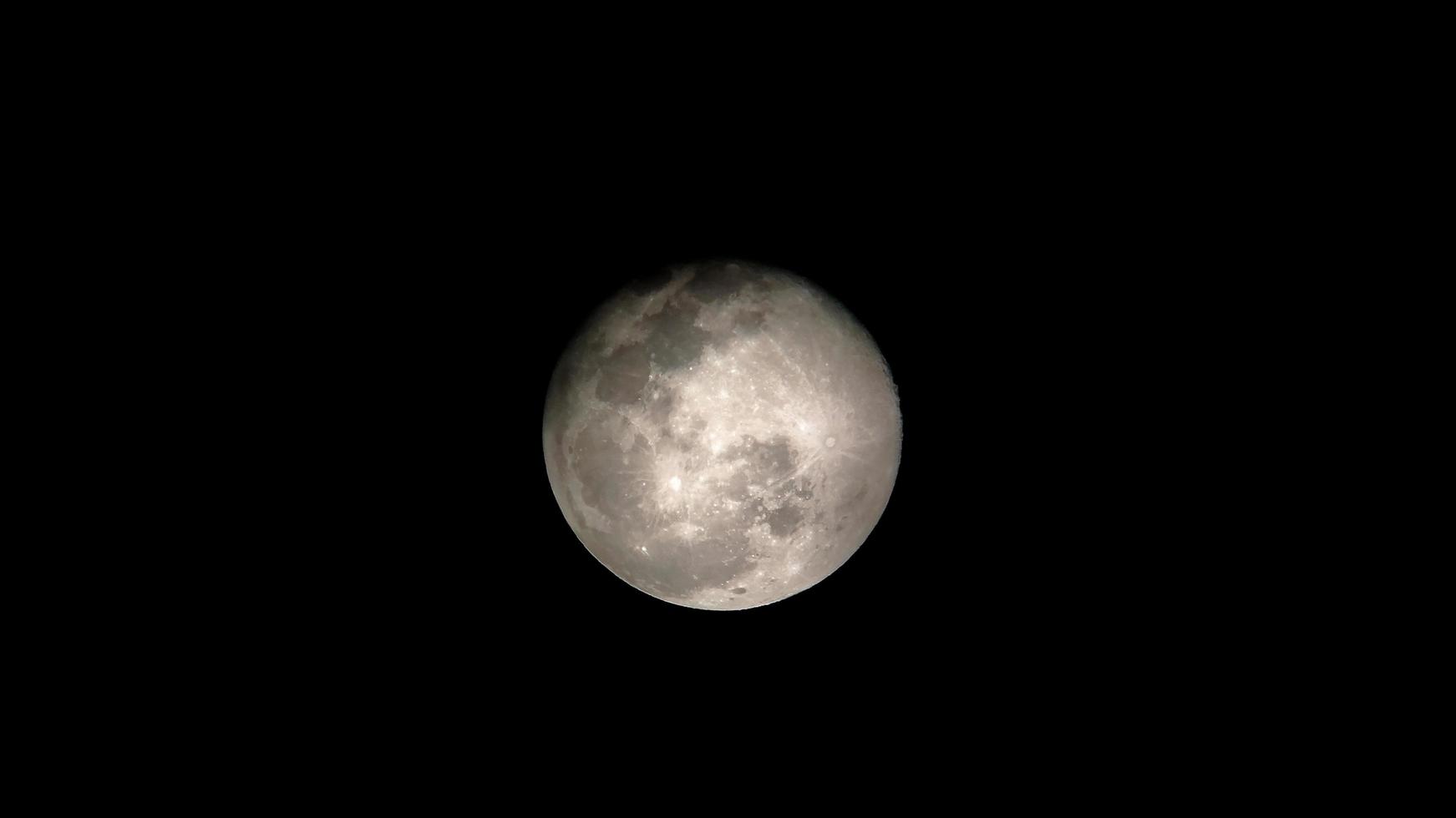 Super full moon with dark background. Madrid, Spain, Europe. Horizontal Photography. photo