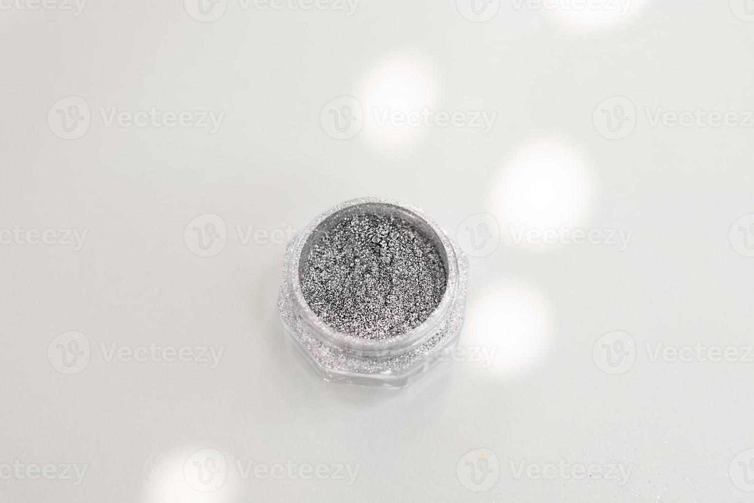 Silver sequins for nails and body.  Glitter can be used on nails and body.  Glitter for manicure, pedicure and body. photo