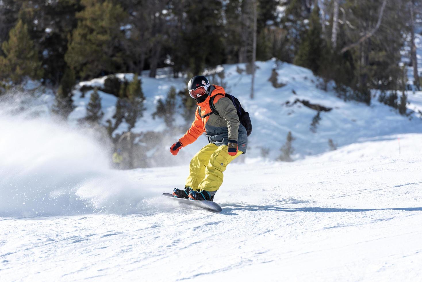 Grandvalira, Andorra . 2022 febrary 1 . Young man on snowboard in the Pyrenees at the Grandvalira ski resort in Andorra in Covid19 time photo