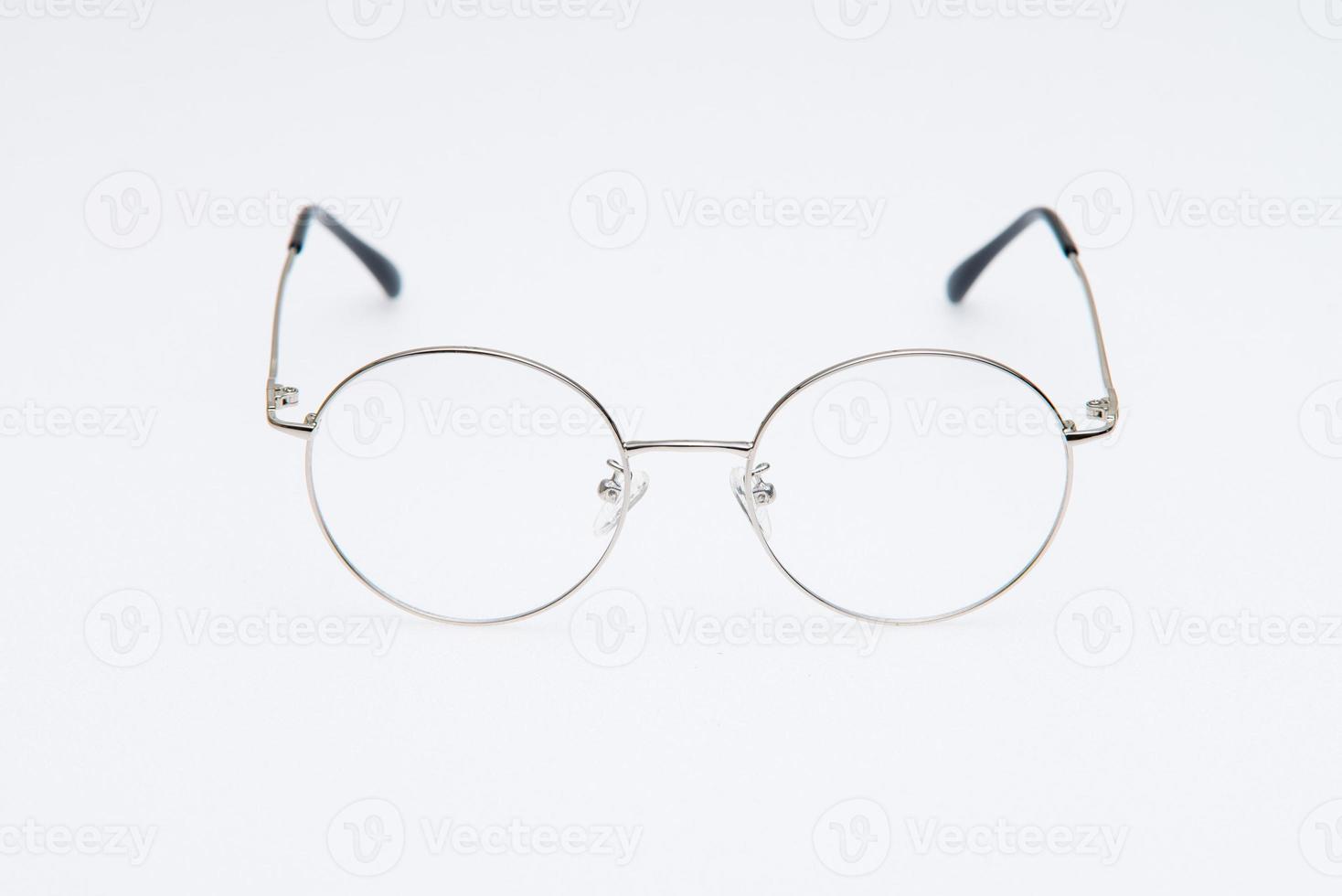 Fashion sunglasses silver frames on white background. photo