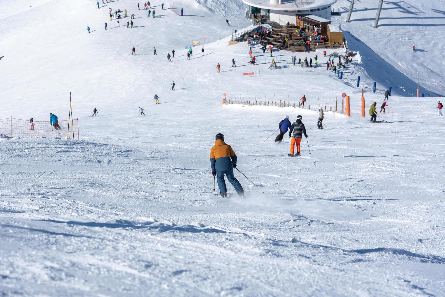 Grandvalira, Andorra . 2022 02 23 .Young man skiing in the Pyrenees at the Grandvalira ski resort in Andorra in Covid19 time photo