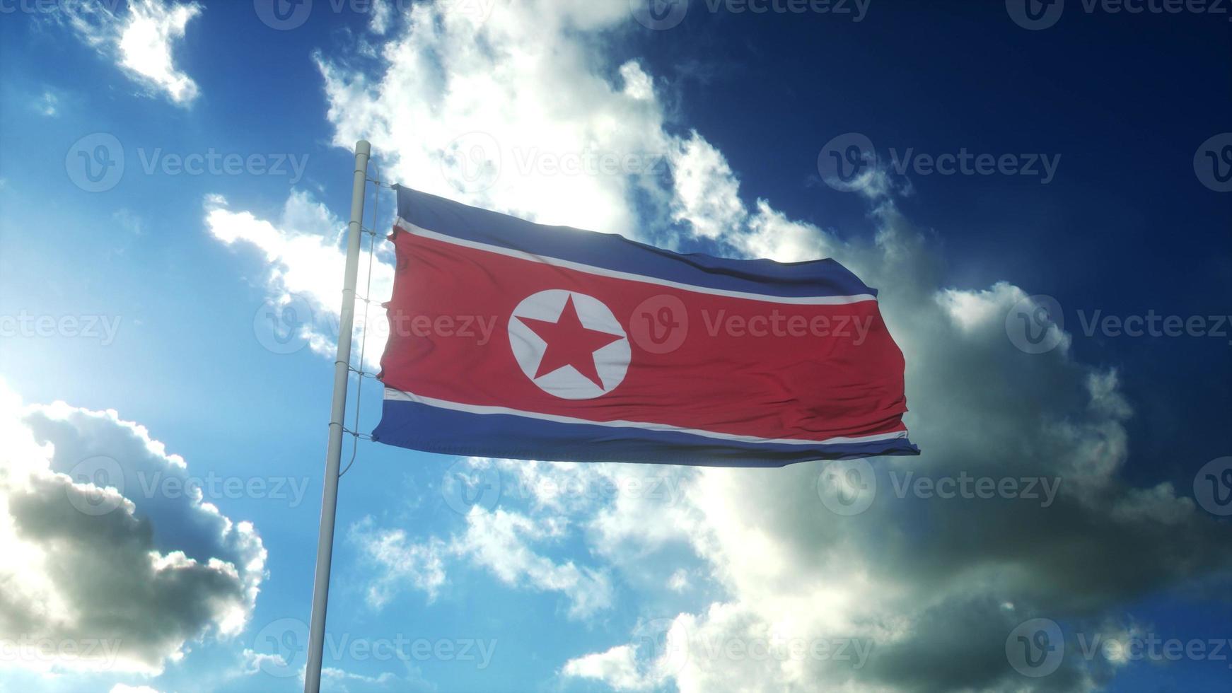 bandera de corea del norte ondeando al viento contra el hermoso cielo azul. representación 3d foto
