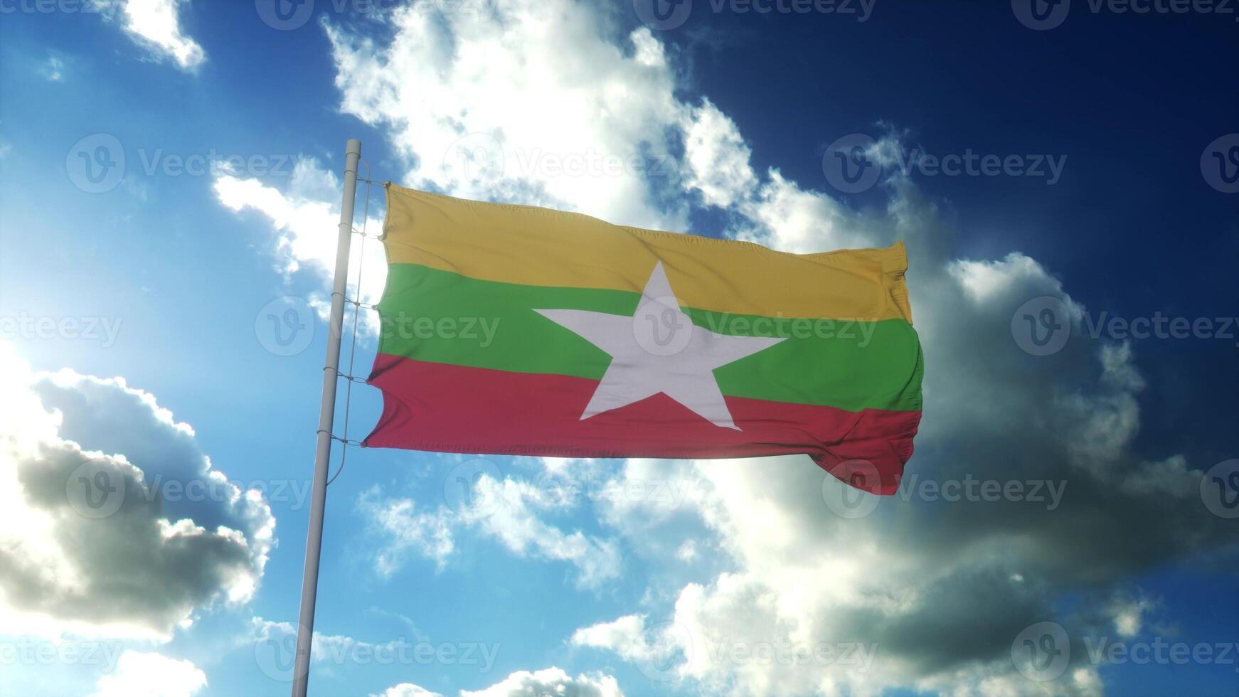 Flag of Myanmar waving at wind against beautiful blue sky. 3d rendering photo