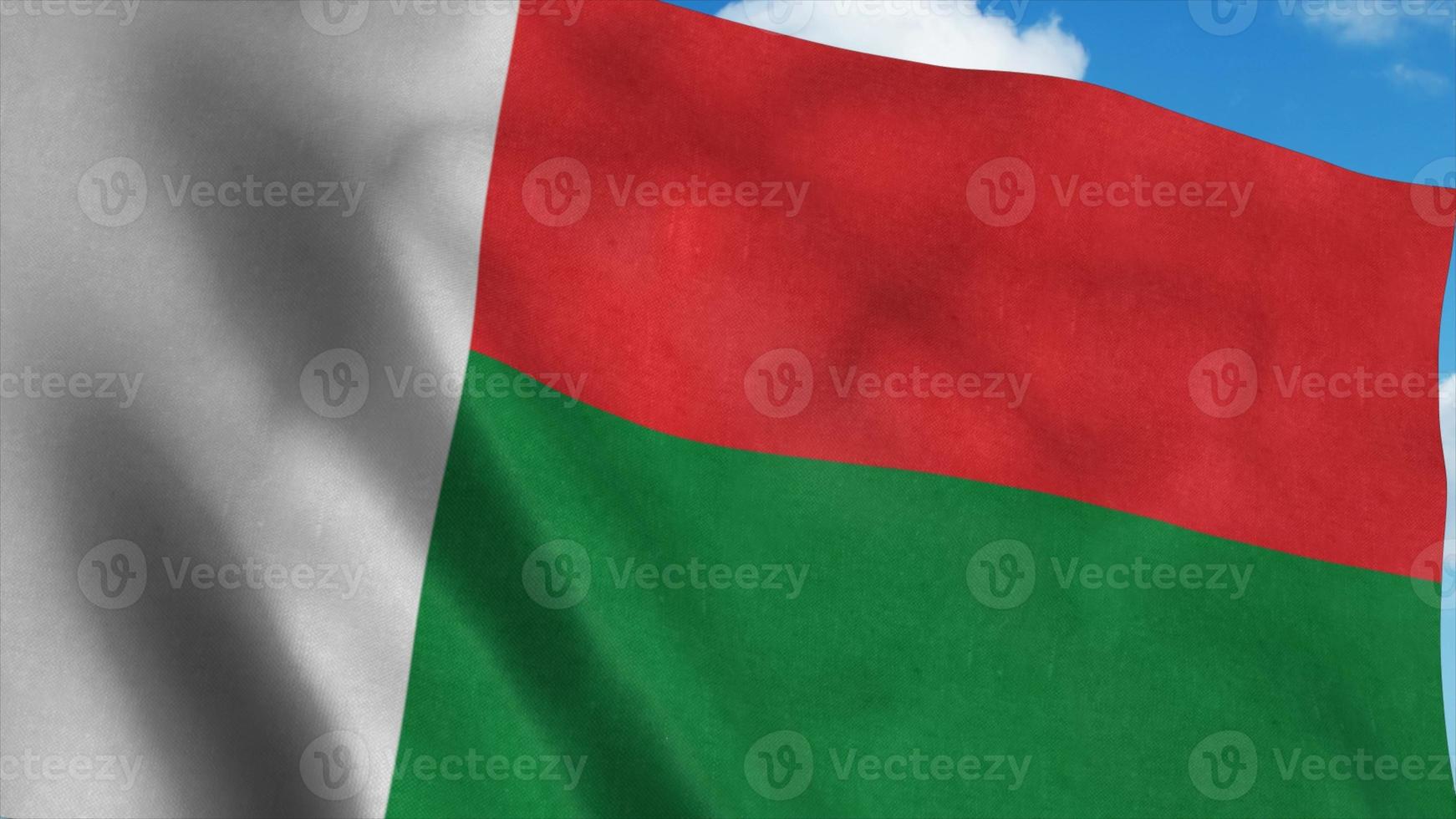 bandera de madagascar ondeando en el viento, fondo de cielo azul. representación 3d foto