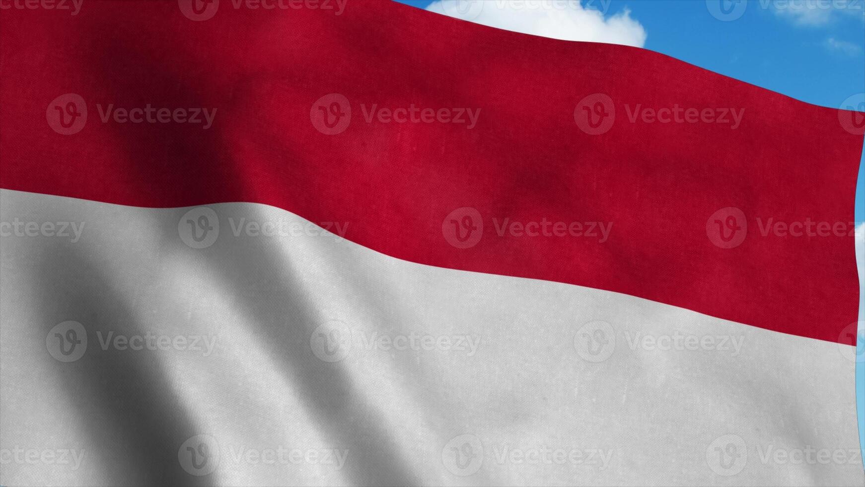 Monaco flag on a flagpole waving in the wind, blue sky background. 3d rendering photo