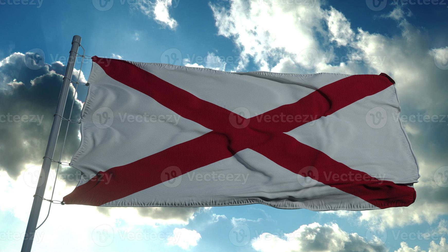 bandera de alabama en un asta de bandera ondeando en el viento en el cielo. representación 3d foto