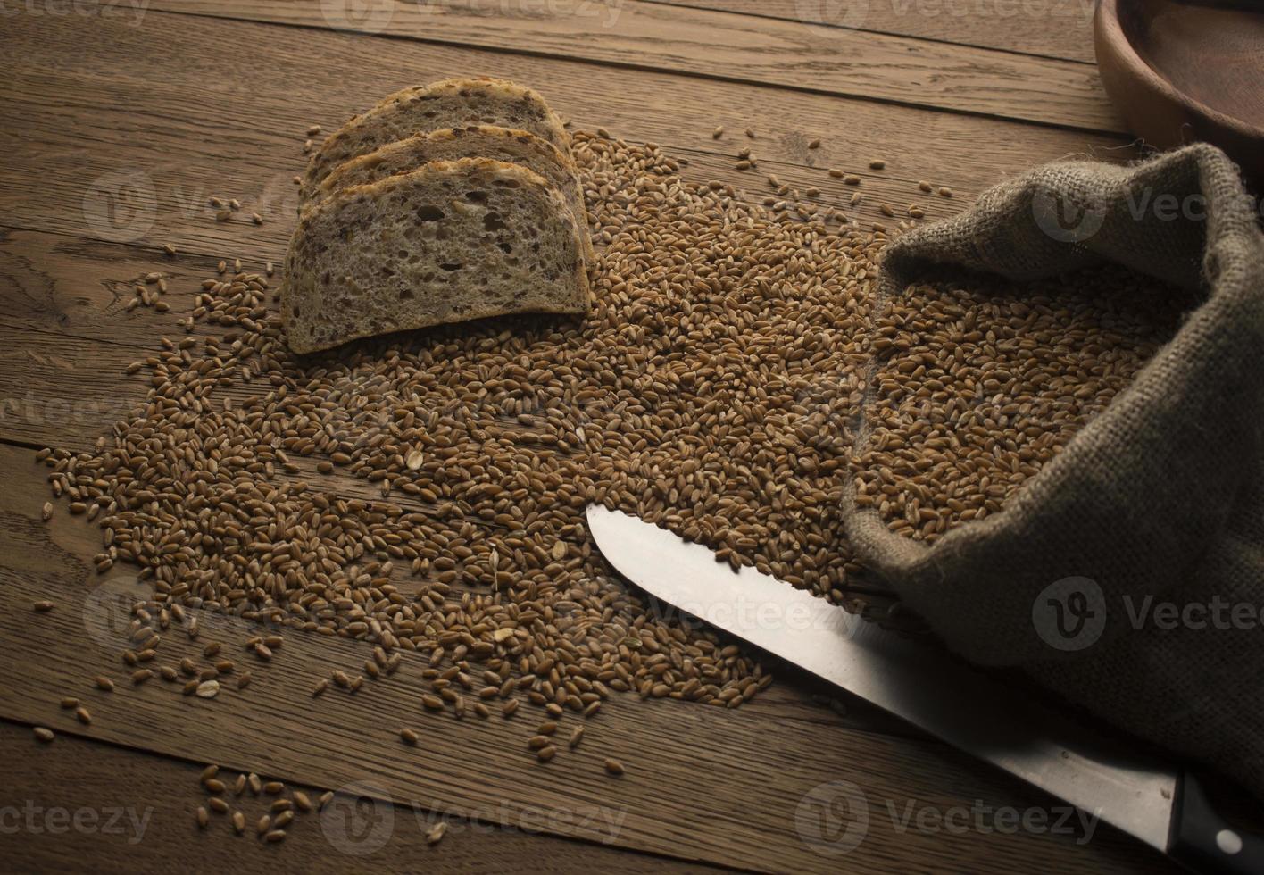 sliced bread on wooden background photo