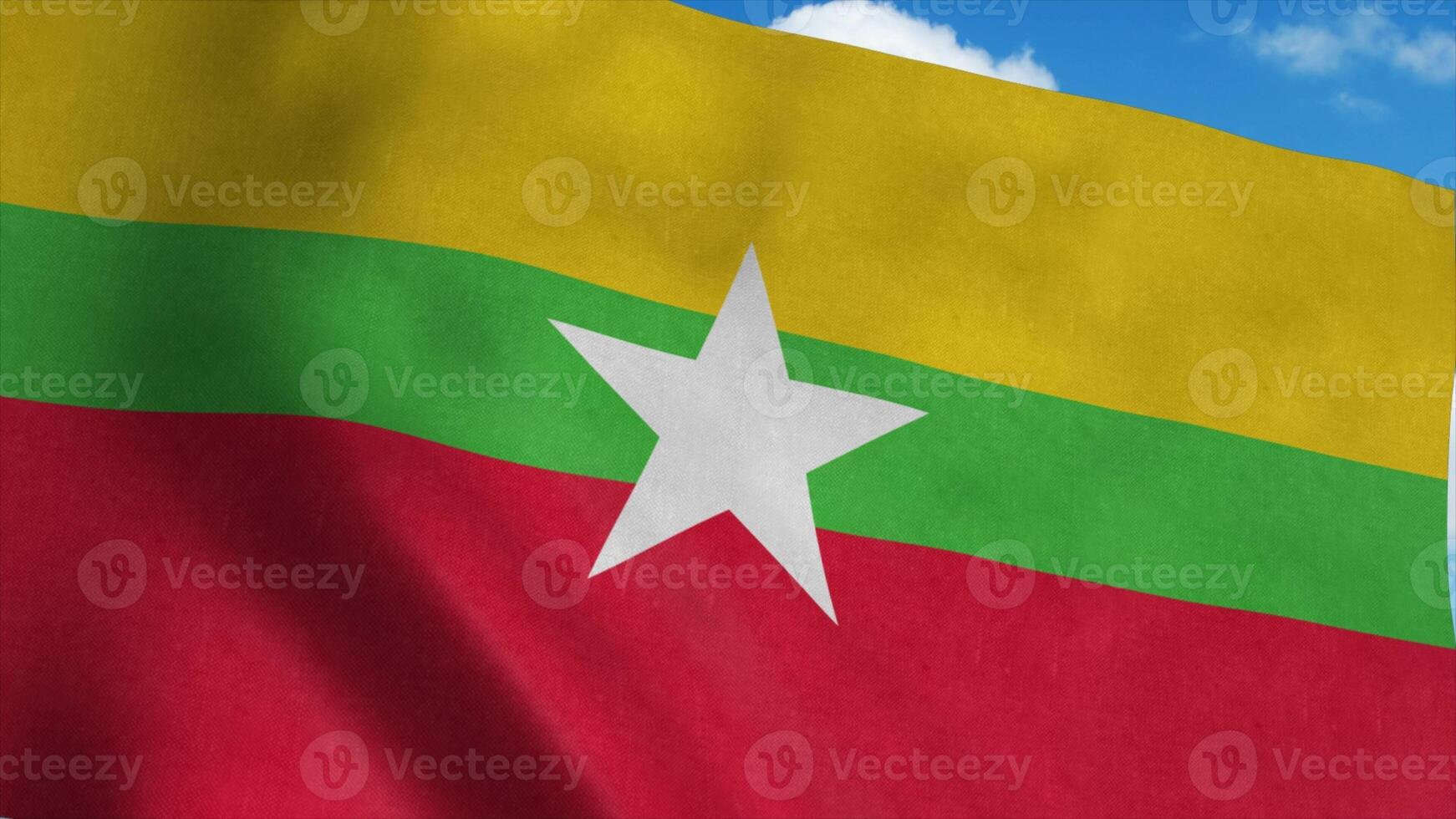 Myanmar flag on a flagpole waving in the wind, blue sky background. 3d rendering photo